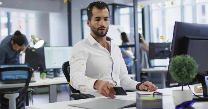 Office worker sliding desk pad and revealing smartphone, unlocking screen and scrolling work data