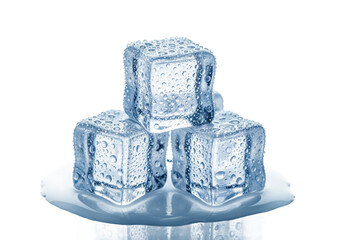 Stack of three clear ice cubes with condensation melting on a reflective surface isolated on transparent background