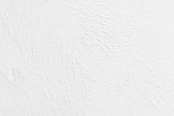 White concrete wall texture background. Uneven render stucco white painted concrete wall texture background. Rough and grunge wall in the sun.