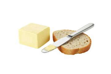 A high-key studio photograph featuring a stick of butter, a slice of bread, and a butter knife, all isolated on a transparent background.