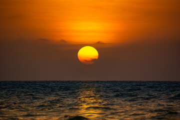 View of a beautiful sunset on the beautiful Colombian beaches