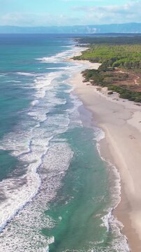 Discover Berchida Beach in Sardinia. Enjoy the beautiful sandy shore, gentle waves, and picturesque landscapes that attract locals and tourists alike.