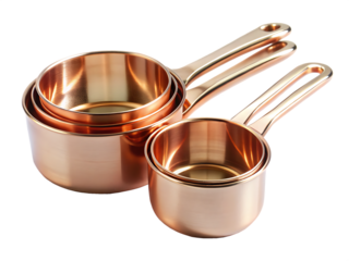 Set of Four Polished Copper Measuring Cups with Handles on White Background kitchenware baking isolated on a transparent background