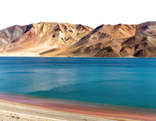 A serene landscape view featuring a tranquil turquoise lake and imposing, textured, colorful mountains