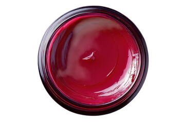 Top view of a jar filled with vibrant red lip gloss creating a striking contrast on transparent background
