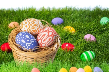 Collection of the beautiful colored easter eggs in the basket