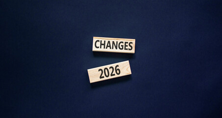 Changes 2026 symbol. Concept words Changes 2026 on beautiful wooden blocks. Beautiful black paper background. Business and changes 2026 concept. Copy space.