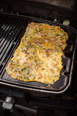 Omelette auf der Grillplatte