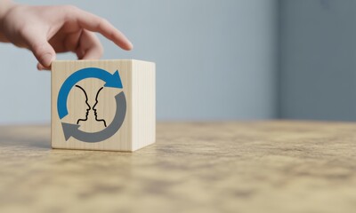 Relationship Icon: A hand gently interacts with a wooden block featuring a symbolic representation of a relationship, highlighting the essence of collaboration and interaction. 