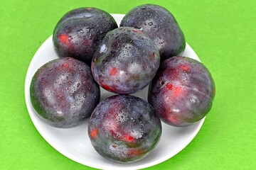 Obraz premium Fresh prunes, natural, juicy and healthy