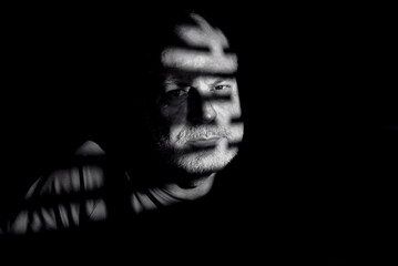 portraits facial expression body movements modern man in black and white photo fine art silhouette image of expression lighting light and shadow