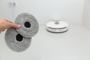 Vacuum cleaner on white glass ceramic tile floor