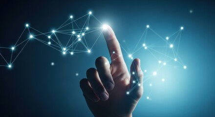Obraz premium Human hand touches a bright, illuminated network of connected dots on a dark background