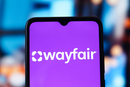 In this photo illustration, the Wayfair logo is seen displayed on a smartphone screen.