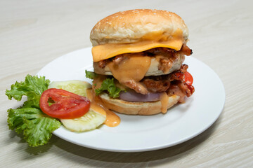 Mozzarella double patty burger creation, generously topped and smothered in a rich, creamy sauce. Perfect for menus, ads, and culinary inspiration.