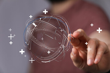 Hand interacting with digital sphere representing global connectivity, future technology and data processing. Modern world concept.