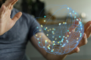 Close-up of a person holding a glowing digital globe, symbolizing global network, communication, and technological advancement. A futuristic and