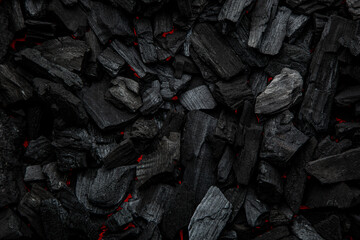 Dark Black Charcoal Briquettes Background Texture