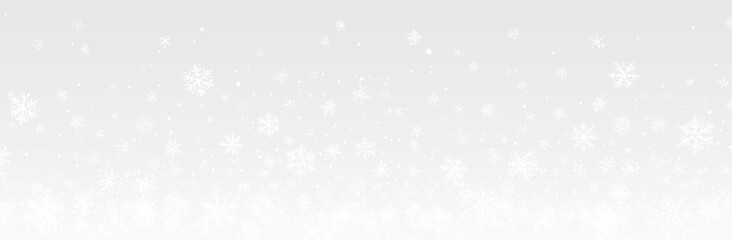Realistic falling snow with white flakes in the air. Snowy texture on transparent background for creating winter mood, overlays, or festive effects.