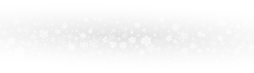 White snowflakes falling on transparent background. Light winter snowfall with multiple shapes and forms. Frosty air overlay for Christmas, winter holidays, or seasonal design