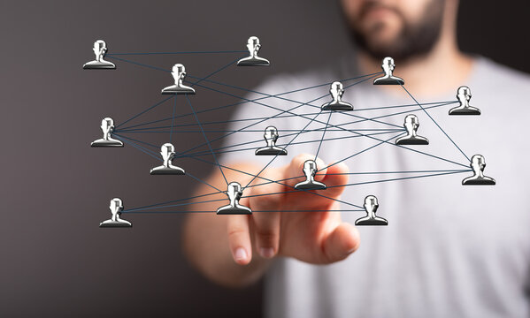 Close up of person touching digital network, symbolizing connection, teamwork and business relationship. Great for business and technology theme