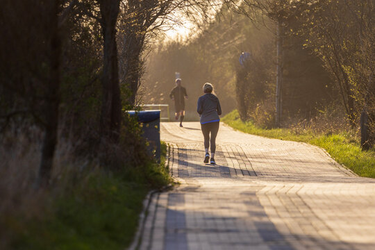 people running in the park