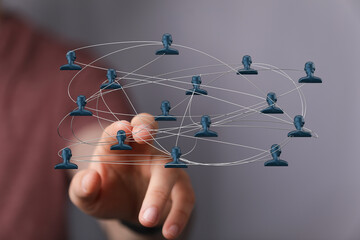 Concept of global network people connection and digital networking of people. Concept of community and society with hand pointing at the digital