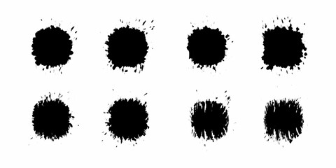 Collection of eight black ink splatters with rough edges and spray effects on a white background