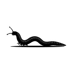 Silhouette of a caterpillar crawling on a flat surface  