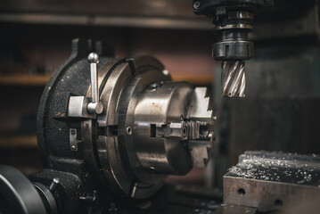 Digital mill being setup for precision manufacturing process in small workshop, West Sussex, UK