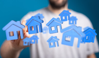 Abstract image of a hand interacting with digital house icons, representing real estate, dreams, and home ownership. Ideal for finance, investme