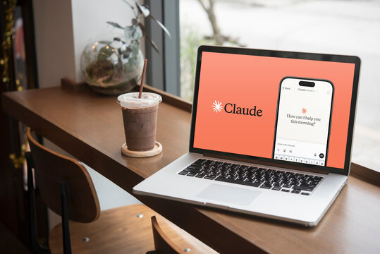 Claude ai chatbot displaying on laptop screen in cafe