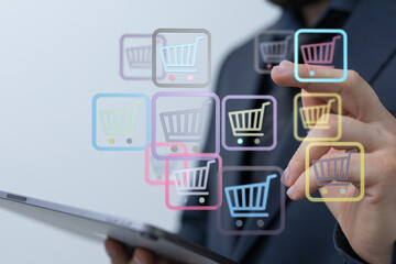 Person interacting with shopping cart icons representing online retail, ecommerce, and digital purchases. Concept of virtual shopping and mobile