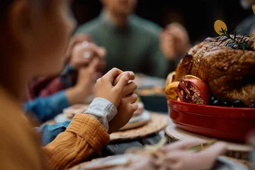 Fotobehang Muziek Close up of Thanksgiving prayer at dining table.  © Drazen