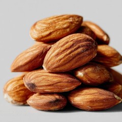 A close-up shot of a pile of raw almonds, ready for consumption 