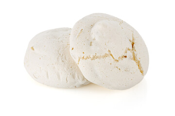 Homemade meringue cookie isolated on white. Close-up