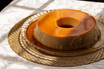 Condensed Milk Pudding, a smooth and creamy dessert made with condensed milk, eggs, and caramel, baked until golden and served chilled. 