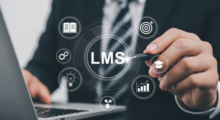 Businessman interacting with a digital interface displaying LMS and various business-related icons.