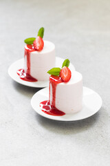 Strawberry cream pudding, Panna Cotta cylindrical shape. With sauce. Close up