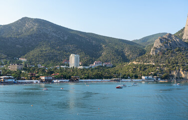 Crimean coast, Mount Sokol and yachts in the Novy Svet bay at sunrise