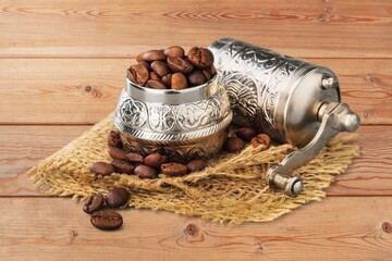 Old metal bowl with aroma coffee beens