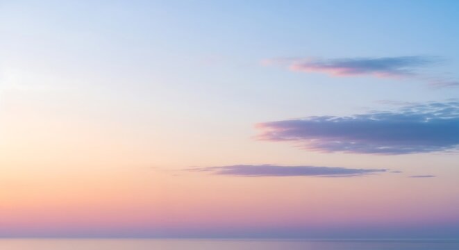 Peaceful pastel sunset sky above calm horizon. - Powered by Adobe