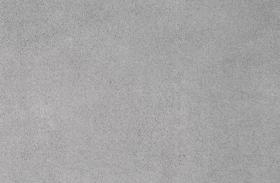 Faux grey Suede texture background, Alcantara texture use on premium computer notebook. Surface of leatherette for textured background.