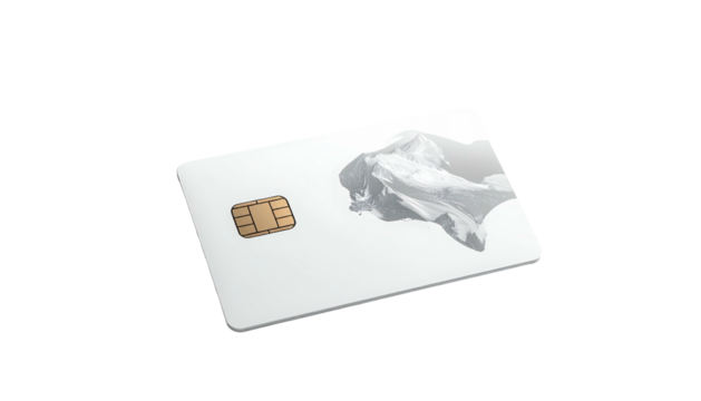 Isolated blank credit card with chip and abstract gray mountain design on a solid black background