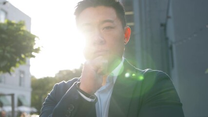 Confused thoughtful Asian Korean 40s business man Chinese Japanese businessman thinking puzzled hesitate looking at camera deciding think create plan decision idea middle-aged male in sunny city sun - Powered by Adobe