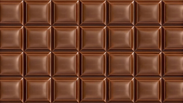 Delicious milk chocolate bar with perfect square pieces, offering a rich, smooth texture and tempting brown color; ideal as a sweet food background or indulgent treat.