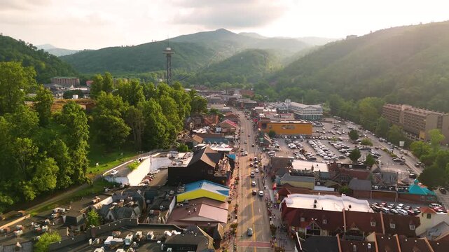 Gatlinburg, Tennessee resort town in Appalachian Mountains with lively main street area featuring shops, eateries and tourist spots. USA travel destination.