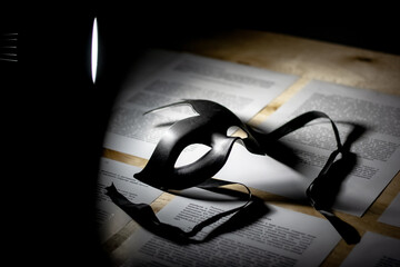 old book with a mask