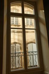Window overlooking windows with wavy metal work France
