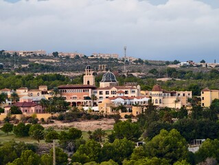 Fototapeta premium serene coastal village, picturesque hilltop settlement with ancient architecture and scenic views